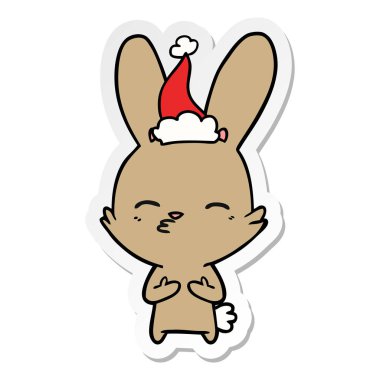 meraklı bunny etiket çizgi giyen Noel Baba şapkası