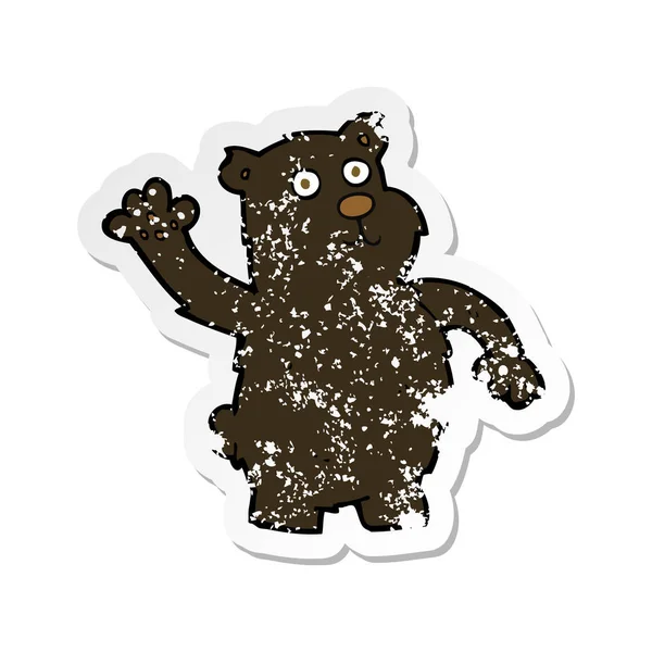 Ретро-стикер, изображающий черного медведя, размахивающего мультфильмом — стоковый вектор