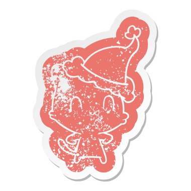 Noel Baba şapkası giyen bir mutlu kedi çizgi film sıkıntılı etiket