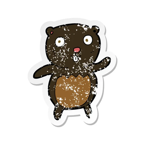 Retro distressed sticker of a cartoon black bear cub — Stock Vector