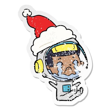 santa s giyen ağlayan bir astronotun sıkıntılı etiket çizgi film