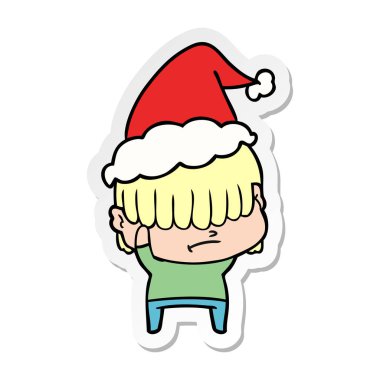 etiket karikatür Noel Baba şapkası giyen dağınık saçlı bir çocuğun