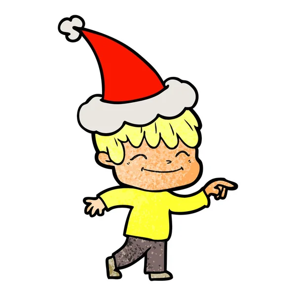 Dibujos animados texturizados de un niño feliz con sombrero de santa — Vector de stock