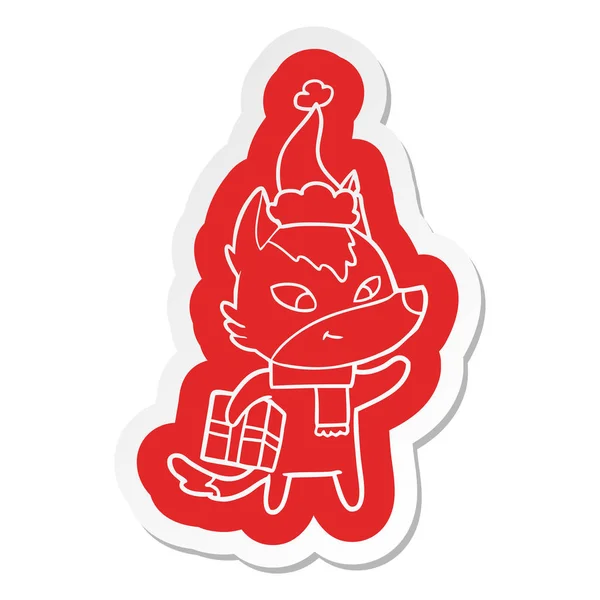 Pegatina de dibujos animados amistosos de un lobo de Navidad con sombrero de santa — Vector de stock