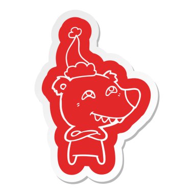 Noel Baba şapkası giyen diş gösterilen bir ayının çizgi film etiketi