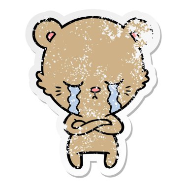 ağlayan bir karikatür sıkıntılı etiket ile katlanmış silah ayı