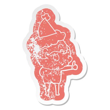 Sakallı Noel Baba şapkası giyen dilini