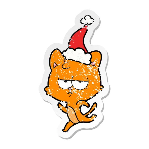 Bored distressed sticker cartoon of a cat wearing santa hat — Stock Vector