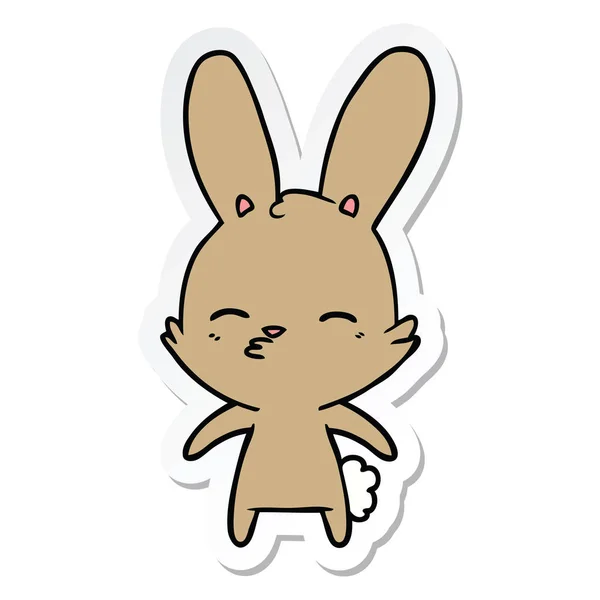 Adesivo di un cartone animato curioso coniglietto — Vettoriale Stock
