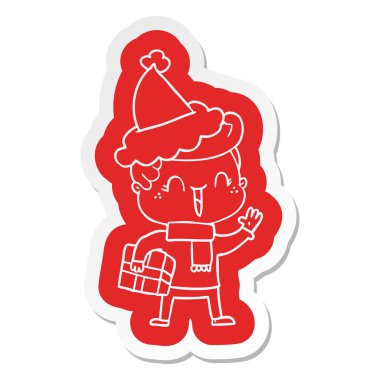 Noel Baba şapkası giyen bir gülen çocuk ilginç çizgi film etiketi