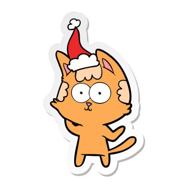 mutlu el etiket karikatür Noel Baba şapkası giyen bir kedi çekilmiş