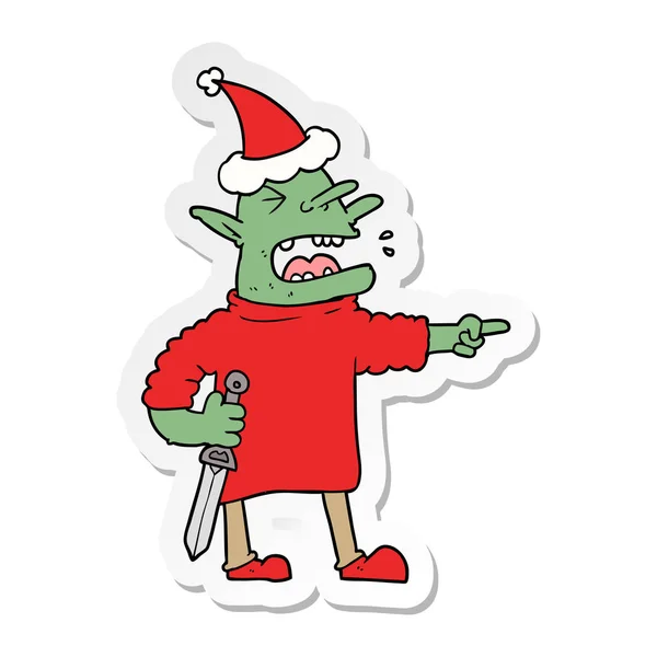 Handgezeichneter Sticker Cartoon Eines Kobolds Mit Messer Mit Weihnachtsmütze — Stockvektor