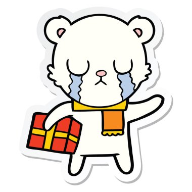 Noel hediye ile ağlayan bir kutup ayısı çizgi film etiketi