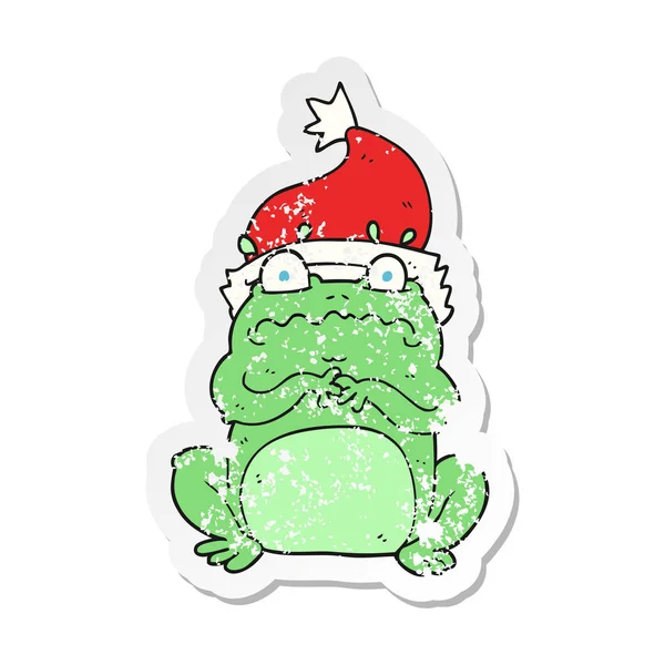 Retro-Aufkleber eines Cartoon-Frosches mit Weihnachtsmütze — Stockvektor