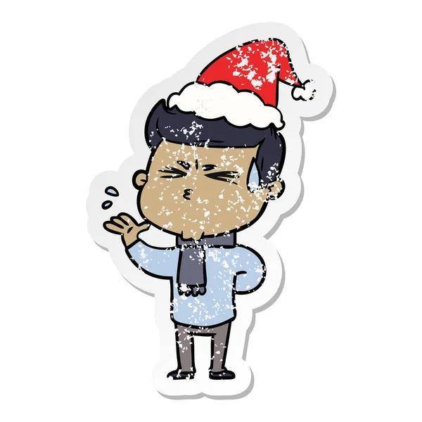 Distressed sticker cartoon of a man sweating wearing santa hat — Stock Vector