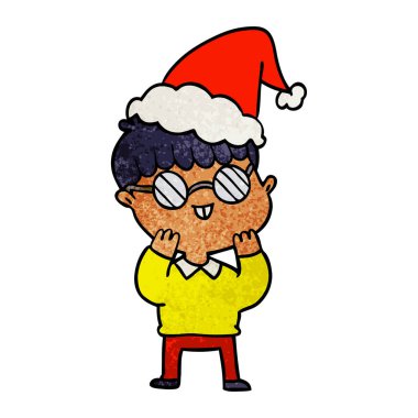 Noel Baba şapkası giyen gözlük takan bir çocuğun dokulu çizgi film el çekilmiş