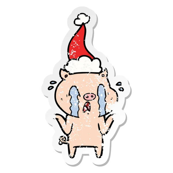 Crying Pig Hand Drawn Distressed Sticker Cartoon Wearing Santa Hat — Stock Vector