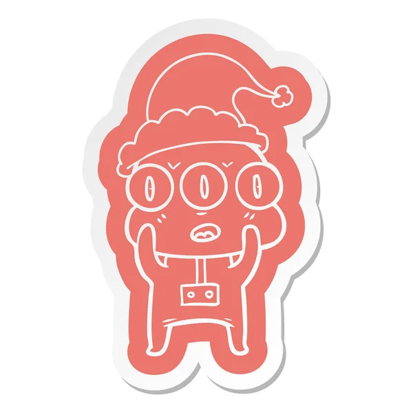 Quirky Cartoon Sticker Three Eyed Alien Wearing Santa Hat — Stock Vector