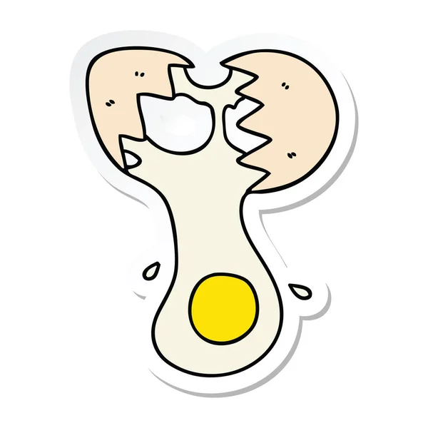 Sticker of a quirky hand drawn cartoon cracked egg — Stock Vector