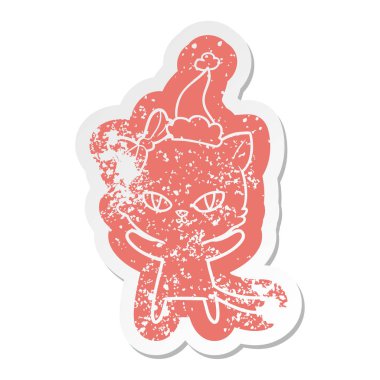 etiket Noel Baba şapkası giyen bir kedi sevimli ilginç çizgi sıkıntılı