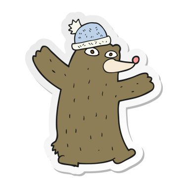 şapka giyen bir karikatür ayının etiket