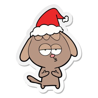 etiket karikatür sıkılmış bir köpek Noel Baba şapkası giyen el çekilmiş