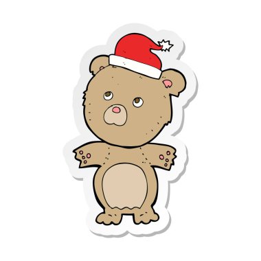 Noel şapkalı bir karikatür ayının etiket