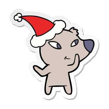 şirin etiket karikatür Noel Baba şapkası giyen bir ayının