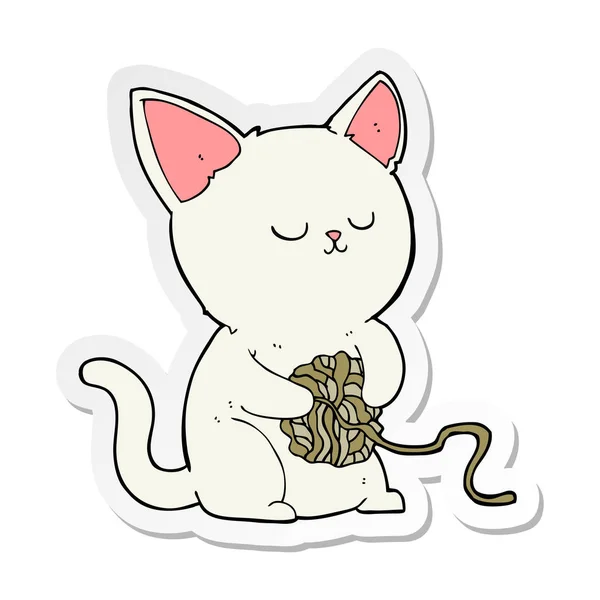 毛糸の玉で遊んで漫画猫のステッカー — ストックベクタ