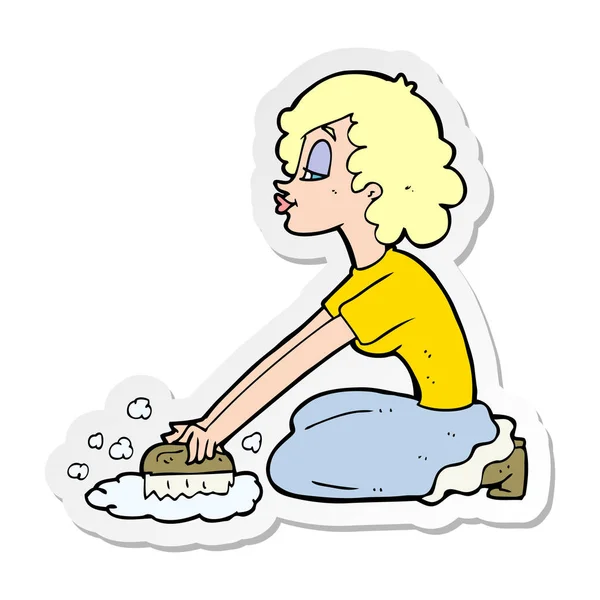 Sticker of a cartoon woman scrubbing floor — Stock Vector