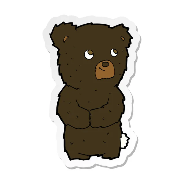 Klistermärke Tecknad Black Bear Cub — Stock vektor