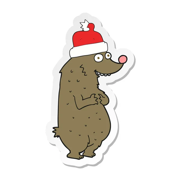 Aufkleber Eines Cartoon Bären Mit Weihnachtsmütze — Stockvektor
