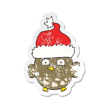 Retro etiket Noel şapka giymiş bir karikatür baykuş sıkıntılı