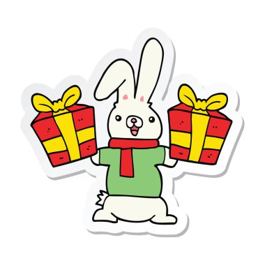 Noel bir karikatür tavşan çıkartması sunar