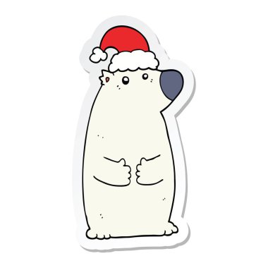 Noel şapka giymiş bir karikatür ayının etiket