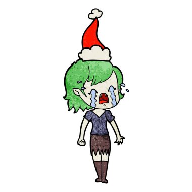 Noel Baba şapkası giyen ağlayan bir vampir kız dokulu çizgi film el çekilmiş