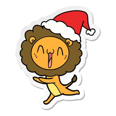 mutlu el etiket karikatür Noel Baba şapkası giyen aslan çekilmiş
