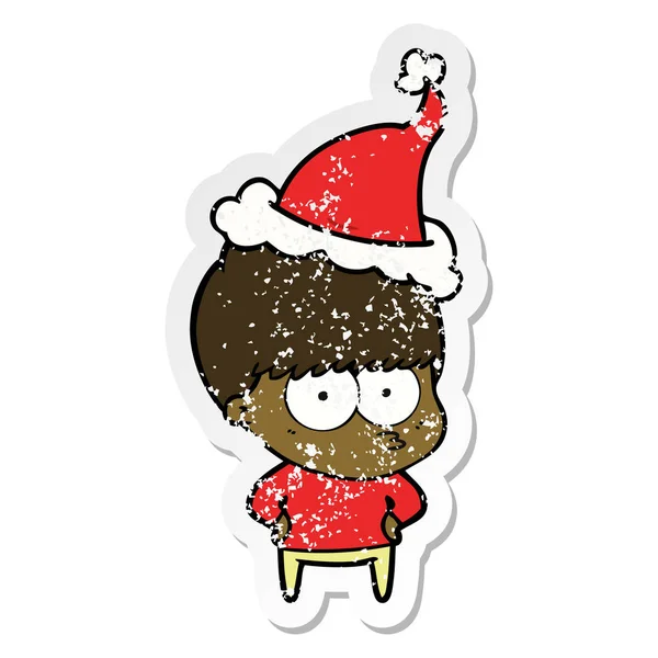 Sıkıntılı Etiket Karikatür Noel Baba Şapkası Giyen Bir Çocuğun Sinir — Stok Vektör