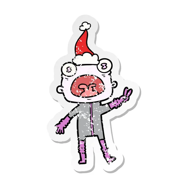 Hand Drawn Distressed Sticker Cartoon Weird Alien Waving Wearing Santa — Stock Vector