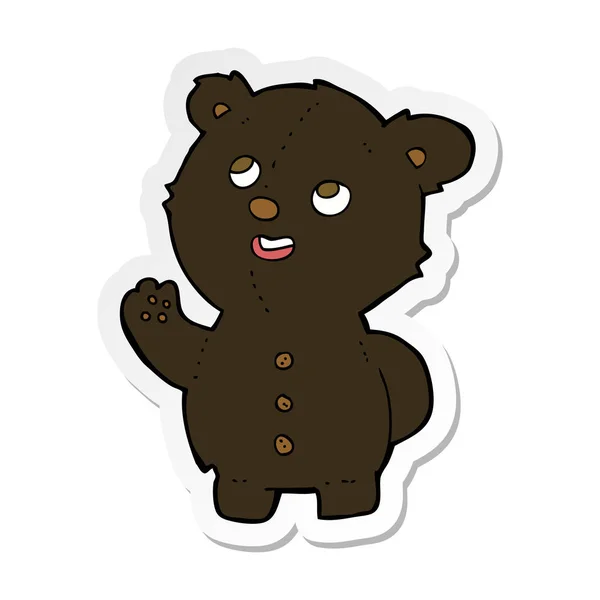 Sticker of a cartoon cute black bear cub — Stock Vector