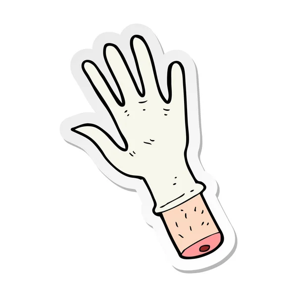 Autocollant d'une main de dessin animé avec gant médical — Image vectorielle