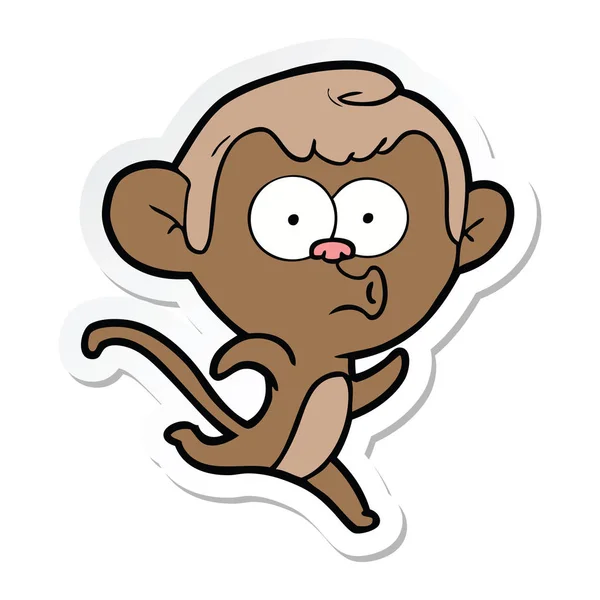 Sticker of a cartoon surprised monkey — Stock Vector