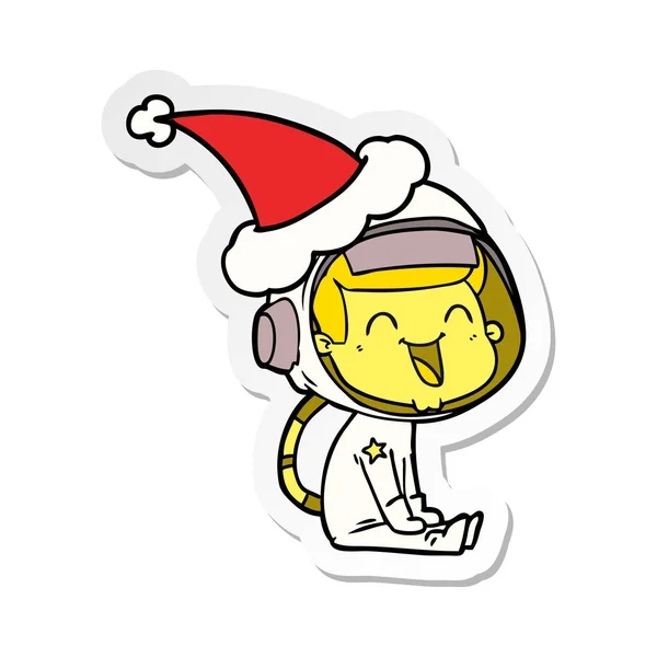 Glückliche Handgezeichnete Sticker Karikatur Eines Astronauten Mit Weihnachtsmütze — Stockvektor