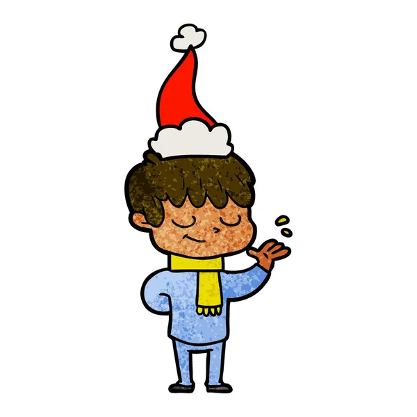 산타 모자를 쓰고 행복 한 소년의 질감된 만화 — 스톡 벡터