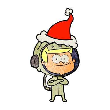 mutlu astronot dokulu karikatür giyen Noel Baba şapkası