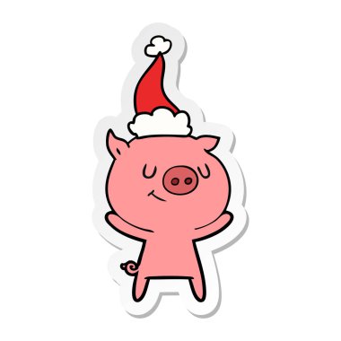 domuz Noel Baba şapkası giyen bir etiket karikatür mutlu el çekilmiş