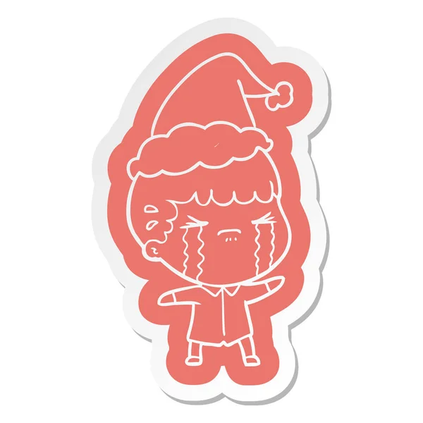 Quirky Cartoon Sticker Man Crying Wearing Santa Hat — Stock Vector