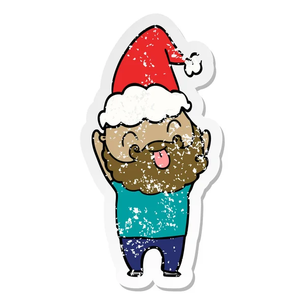 Man with beard sticking out tongue wearing santa hat — Stock Vector