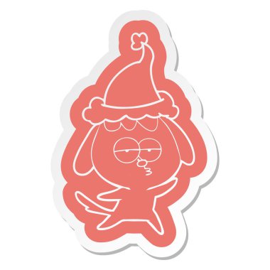 Noel Baba şapkası giyen sıkılmış bir köpek çizgi film etiketi