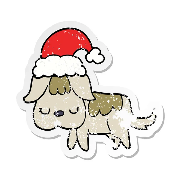 Distressed sticker of a cute christmas dog — Stock Vector